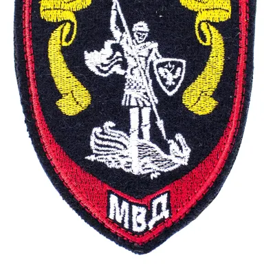 Parche brodé de l'Appareil central de police avec bordure rouge