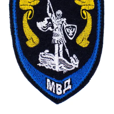Patch brodé de l'Appareil central de police avec bordure bleue